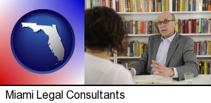 Miami, Florida - a legal consultant conversing with a client